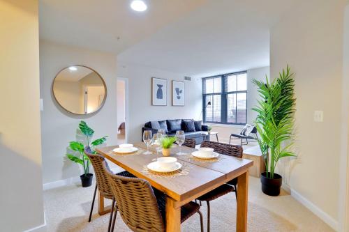 a dining room with a table and chairs at Pentagon City Comfort Modern Stay in Arlington