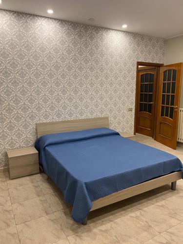 Ένα ή περισσότερα κρεβάτια σε δωμάτιο στο Appartamento Santa House