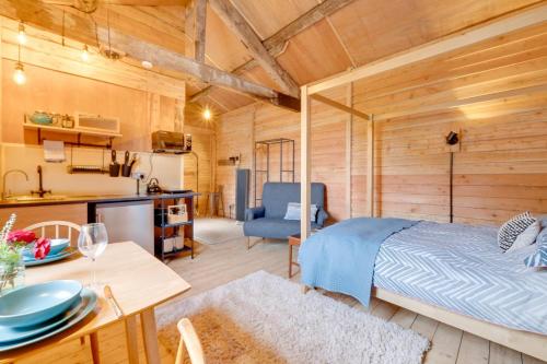 Ένα ή περισσότερα κρεβάτια σε δωμάτιο στο Dog Crag Cabin