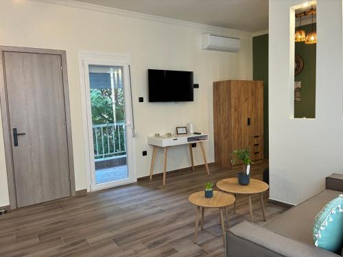 TV a/nebo společenská místnost v ubytování Olive House