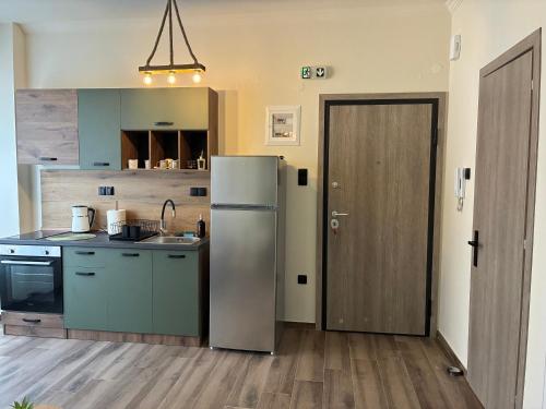Kuchyň nebo kuchyňský kout v ubytování Olive House