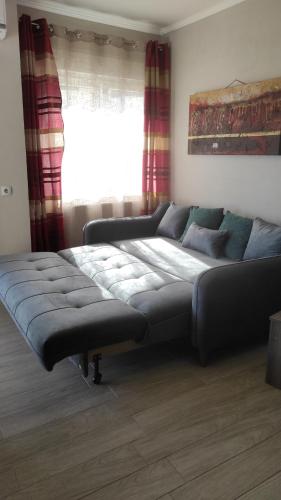 Ένα ή περισσότερα κρεβάτια σε δωμάτιο στο Spartacus Apartment