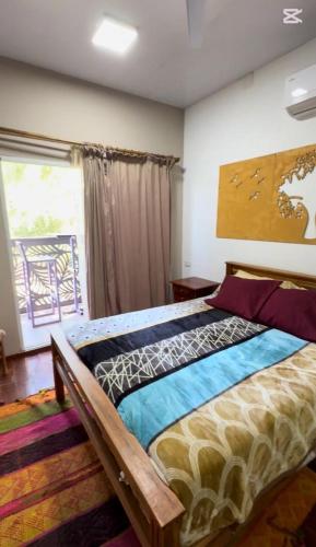 a bedroom with a large bed in a room at Finca en Santiago del Estero in La Banda