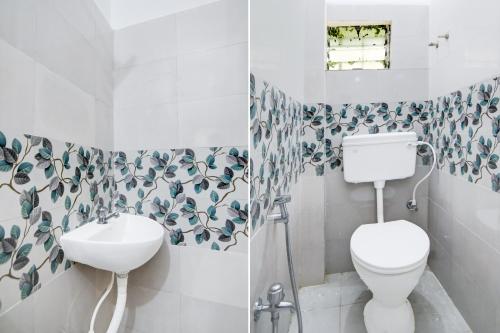 a bathroom with a toilet and a sink at Hotel O SAFAR STAY in Kolkata