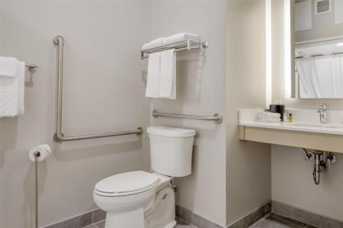 a bathroom with a toilet and a sink at Best Western Plus Bridgewater Hotel & Convention Centre in Bridgewater