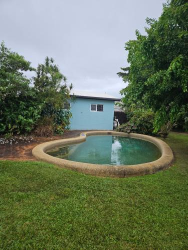 a small pool of water in the middle of a yard at Gorgeous Private Relaxing Quite Homestay in Westcourt