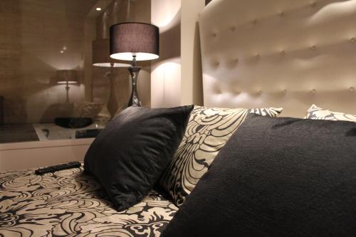 Letto o letti in una camera di Escuderos Hotel Cruz