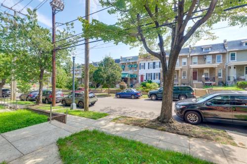 a street with cars parked in a parking lot at half Mi to Metrobus Stop! Walkable Petworth Duplex in Washington