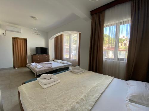 A bed or beds in a room at Apartmani Nilaj