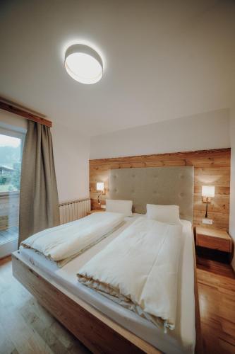 Ένα ή περισσότερα κρεβάτια σε δωμάτιο στο Appartements Rettenbacher