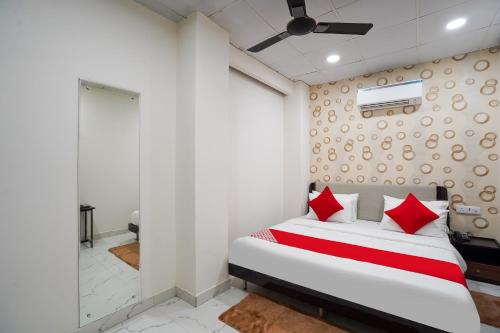 Katil atau katil-katil dalam bilik di Hotel O Mannat