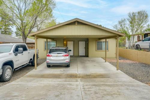 a car parked in front of a house at Walk to Downtown Prescott with Fenced Yard! in Prescott