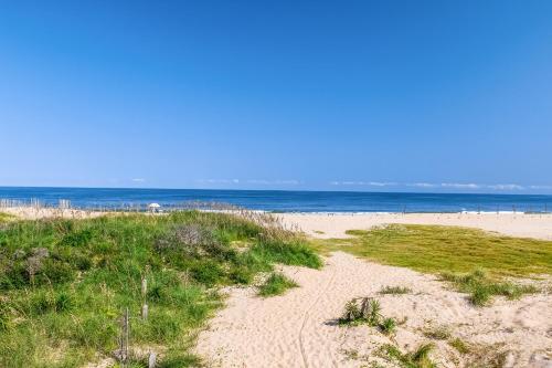 a sandy beach with the ocean in the background at Drum #6A-CAC in Buxton