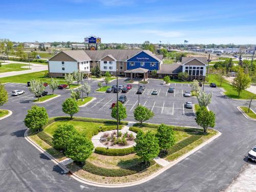 an aerial view of a parking lot at a hotel at AmericInn by Wyndham Green Bay East in Green Bay
