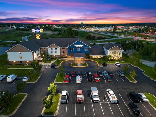 an aerial view of a parking lot at a hospital at AmericInn by Wyndham Green Bay East in Green Bay