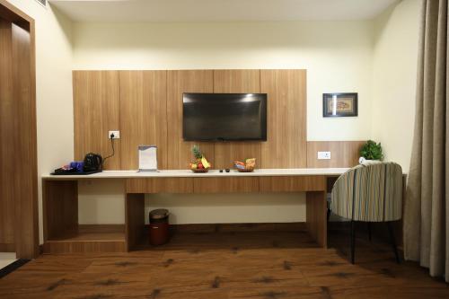 TV a/nebo společenská místnost v ubytování Rukman Hotels