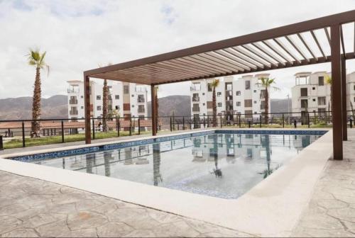 Πισίνα στο ή κοντά στο UNIQ Condo Viñedos del Mar, Valle de Guadalupe