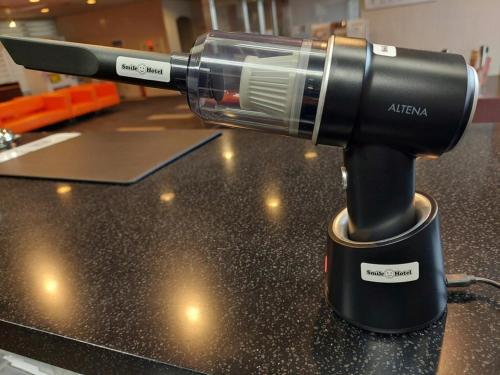 a hair dryer on top of a counter at Smile Hotel Kushiro - Vacation STAY 69842v in Kushiro