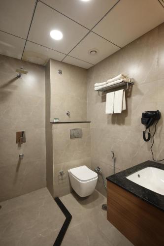 Koupelna v ubytování Rukman Hotels
