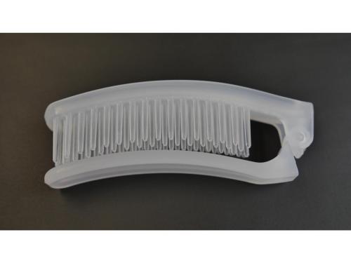 a white comb sitting on top of a table at Smile Hotel Shizuoka Yoshida Inter - Vacation STAY 90880v 