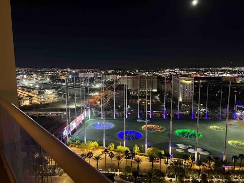 a view of a city at night with lights at Mgm 1 Bedroom Balcony And Or Studio Luxury Suites in Las Vegas