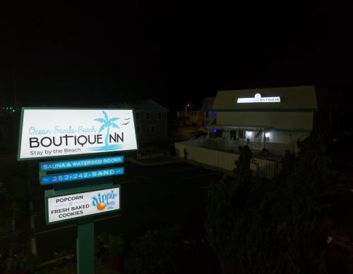 Un certificado, premio, letrero u otro documento en New 2025-Ocean Sands Beach Boutique Inn-Sauna and Salt-Mineral Pool -Free Beach Bikes and Famous Beach-Nightly Popcorn-Bathrobes and Sunscreen in all rooms-Ultra Sparkling Certified-Free Laundry-4 Grand Presidential Black Beds in all rooms