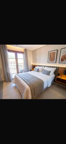 Postel nebo postele na pokoji v ubytování Pyreneus Residence