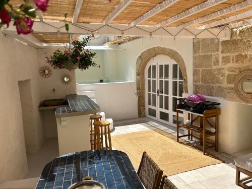 Χώρος καθιστικού στο Maison véla & Jacuzzi