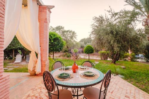 Aed väljaspool majutusasutust Palmeraie, Jardin et Piscine