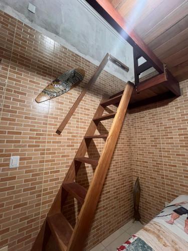 Ένα ή περισσότερα κρεβάτια σε δωμάτιο στο Duplex praia de camarupim