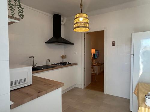 Kuchyň nebo kuchyňský kout v ubytování Casa titamari