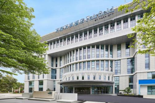 a rendering of the front of the building at Fairfield by Marriott Guangzhou Konggang in Guangzhou