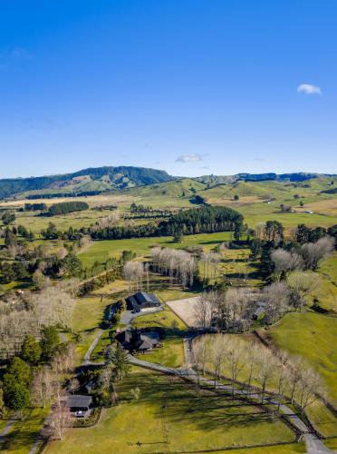 an aerial view of a field with trees and a house at Taupo s best lifestyle vacation in Taupo