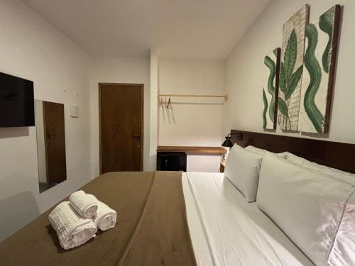 En eller flere senge i et værelse på Quarto pra Casal, no centro de Jericoacoara!