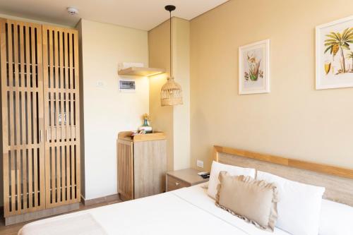 Una cama o camas en una habitación de Mythical Hotel Boutique