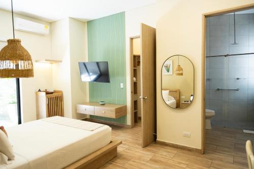 Una cama o camas en una habitación de Mythical Hotel Boutique