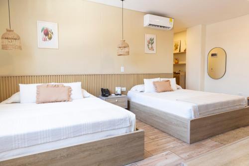 Una cama o camas en una habitación de Mythical Hotel Boutique