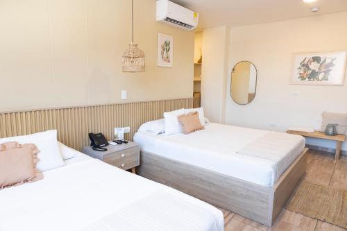 Una cama o camas en una habitación de Mythical Hotel Boutique