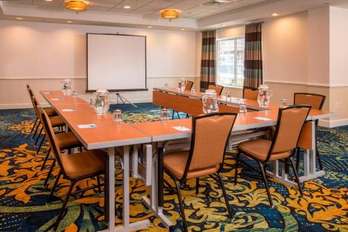 a conference room with a long table and chairs at Springhill Suites by Marriott State College in State College
