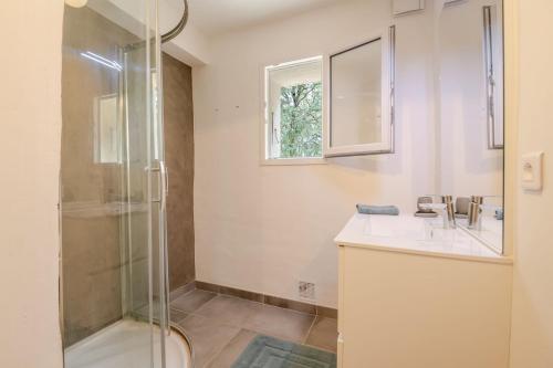 a bathroom with a sink and a shower at La Mathilde - Premium Pool Villa Private Tree-Top Adventure in Bonnieux