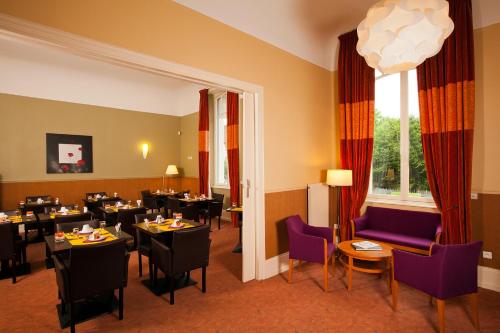Area tempat duduk di Hotels & Résidences - Le Metropole