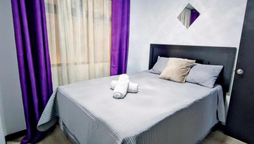 Ένα ή περισσότερα κρεβάτια σε δωμάτιο στο Alojamiento zona 12