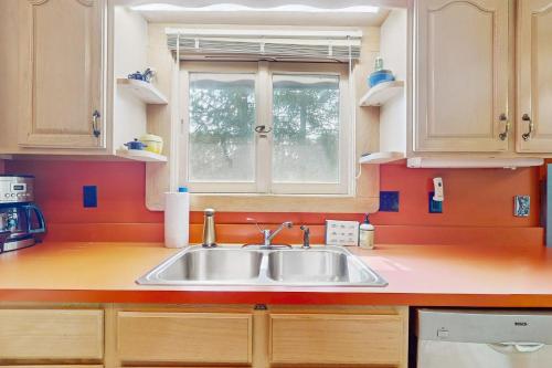 a kitchen with a sink and a window at Lincoln Gap Retreat in Warren