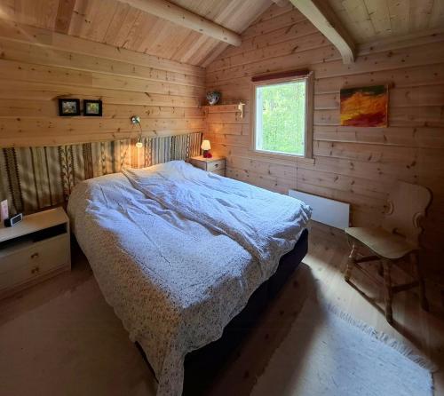 Postel nebo postele na pokoji v ubytování Family Cabin Cluster By Waterfall In Bjorli