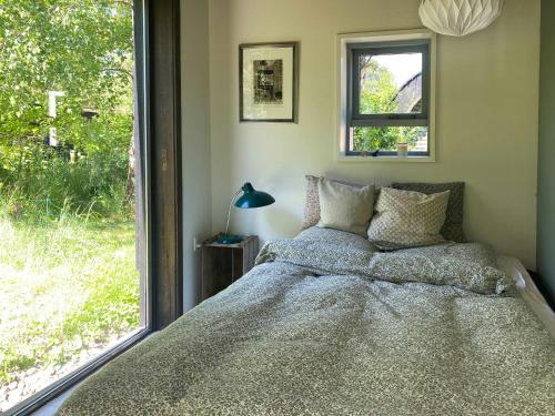 Katil atau katil-katil dalam bilik di Rustic Summer House Near Child-Friendly Beach