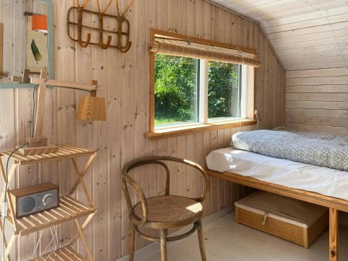 Katil atau katil-katil dalam bilik di Rustic Summer House Near Child-Friendly Beach