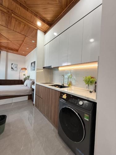 Kuchyň nebo kuchyňský kout v ubytování Hasa Đà Lạt Hotel