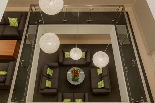 an overhead view of a dining room with three lights at Ela Beach Hotel in Port Moresby