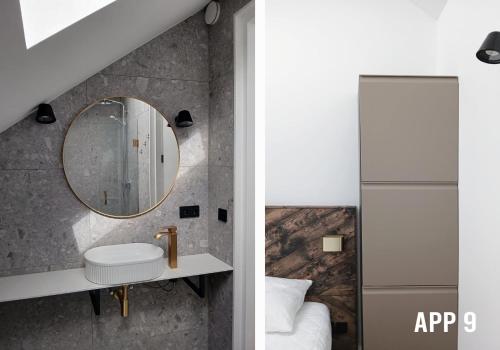 a bathroom with a sink and a mirror at Tussen Dijken in Hollum