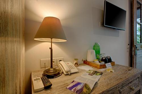 TV a/nebo společenská místnost v ubytování OK Divers Resort & Spa